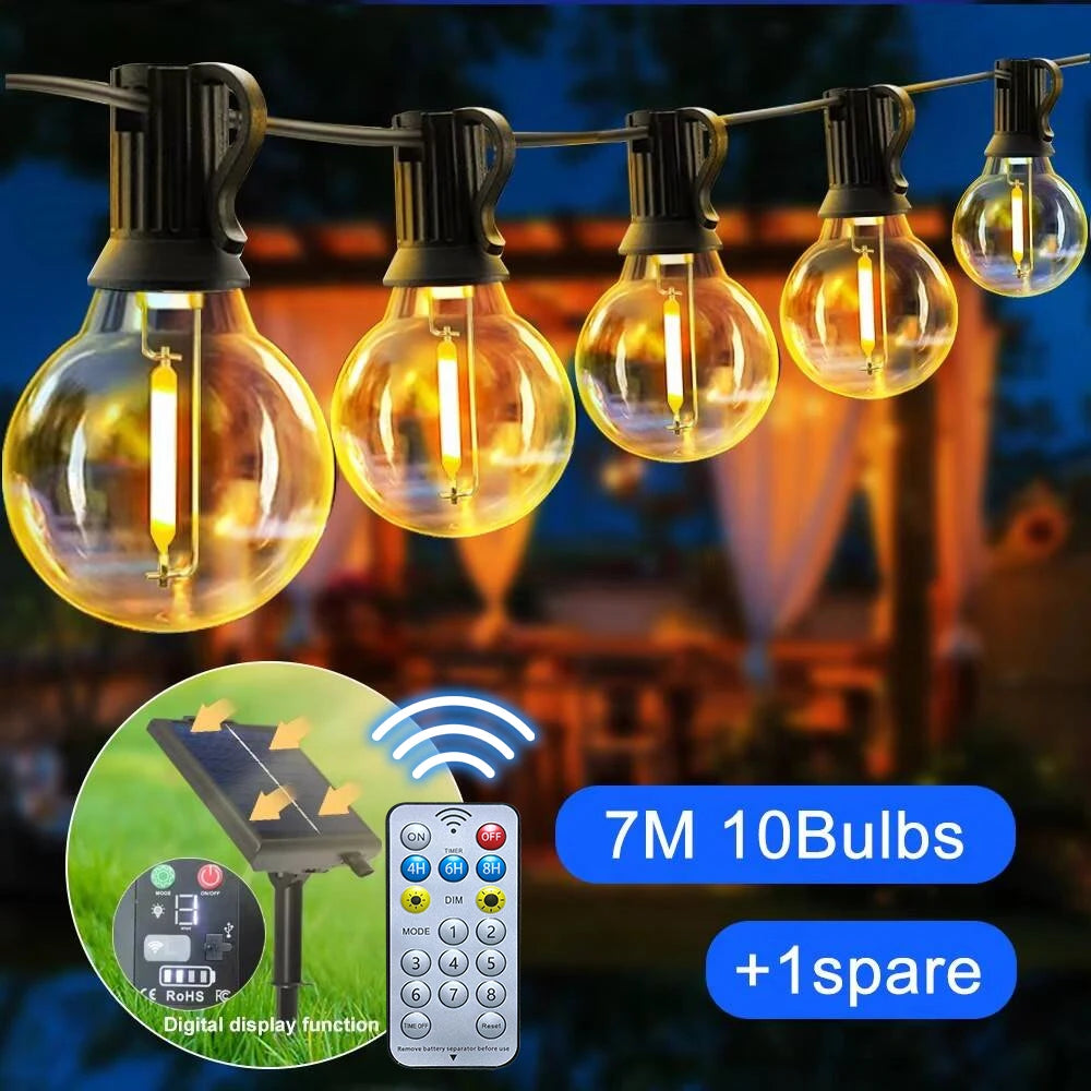 Set of solar-powered G40 globe string lights illuminating a garden patio area at dusk