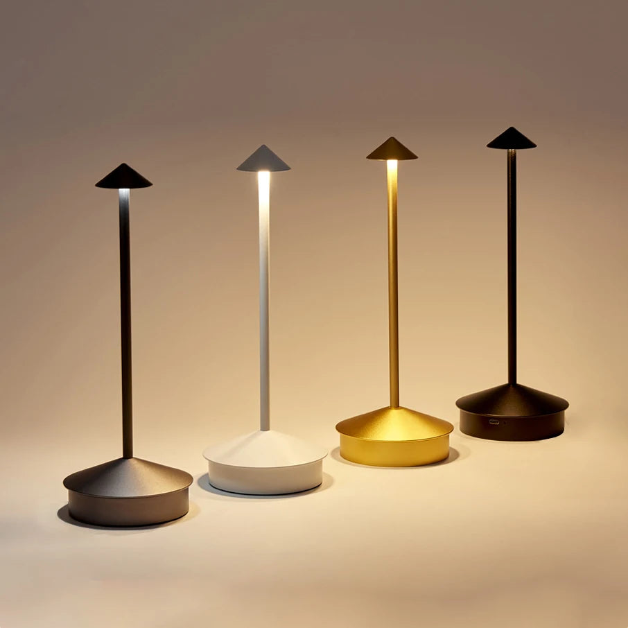 Rechargeable LED table lamp with touch control, white color, on a desk