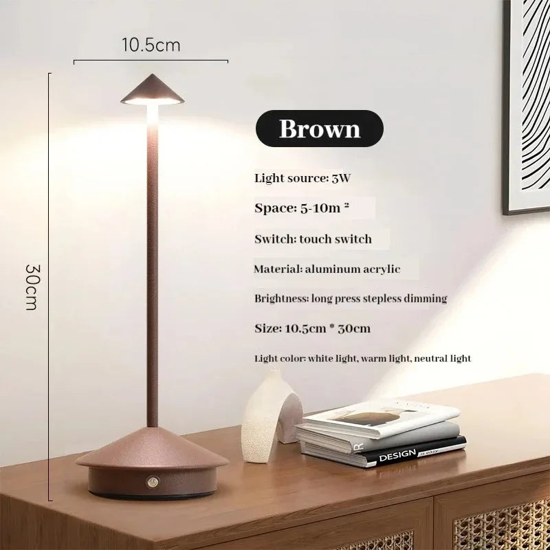 Rechargeable LED table lamp with touch control, white color, on a desk