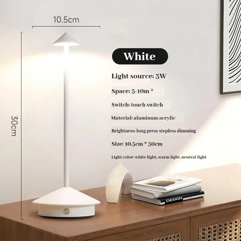 Rechargeable LED table lamp with touch control, white color, on a desk