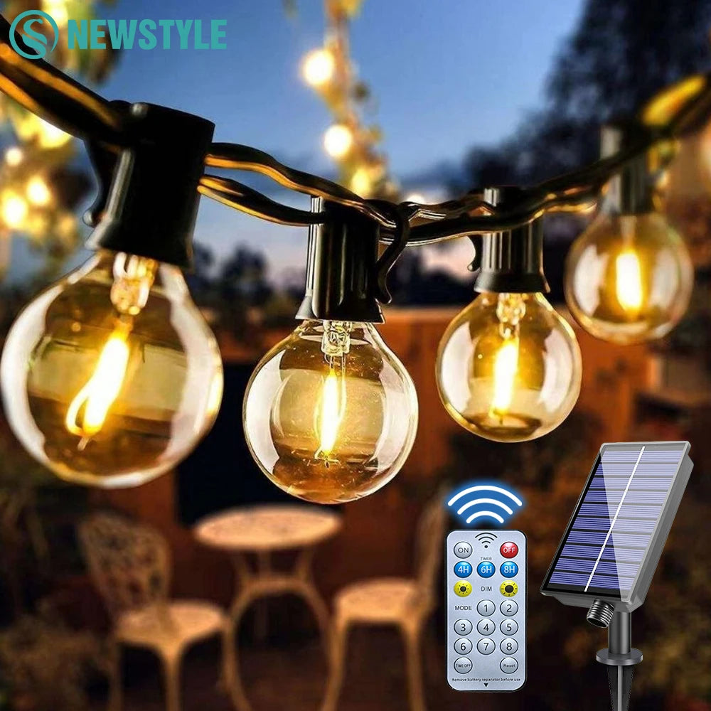 Set of solar-powered G40 globe string lights illuminating a garden patio area at dusk